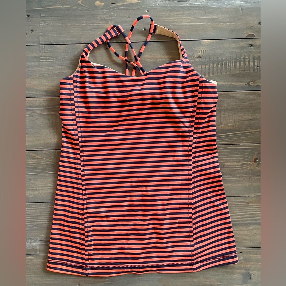 Lululemon Size 8 Tank Top. Built in shelf bra. Great condition.